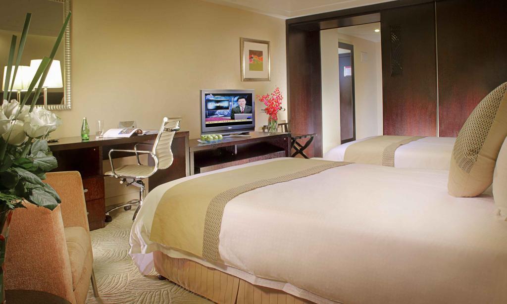 Ramada Plaza Shanghai Gateway Номер фото
